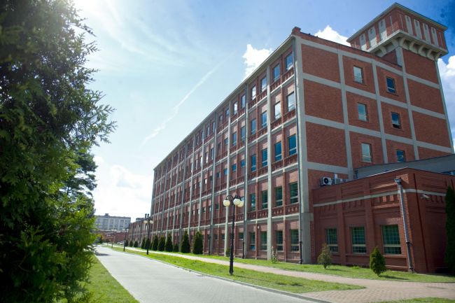 The 5-storey brick building of Lodz University of Technology Library.
