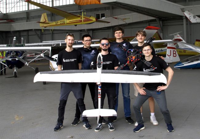 Members of the Student Robotics Research Club and their drone photo: Student Robotics Research Club