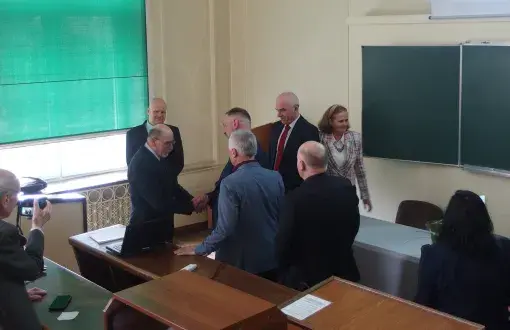 Dr. Stanislaw Pruś receives congratulations after defending his doctorate 