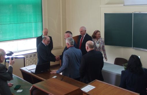 Dr. Stanislaw Pruś receives congratulations after defending his doctorate 
